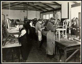 Blind men recaning chairs at the Bourne Memorial Building, New York, 1920